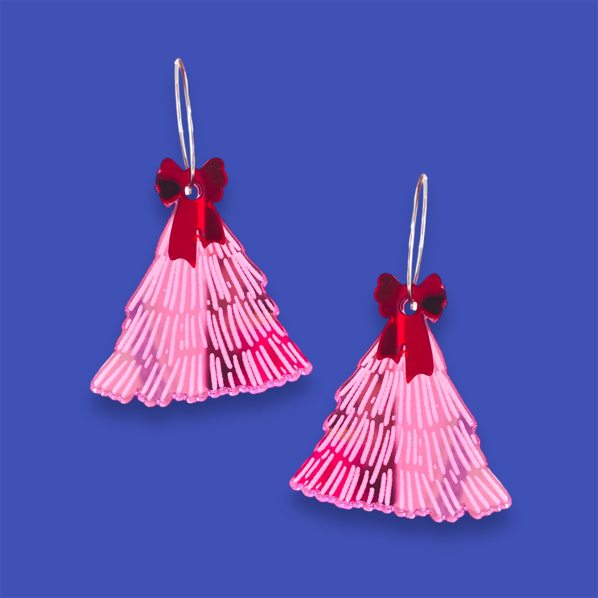 Pink mirror laser-cut acrylic earrings Christmas tree  shape by Crafty Cuts Laser