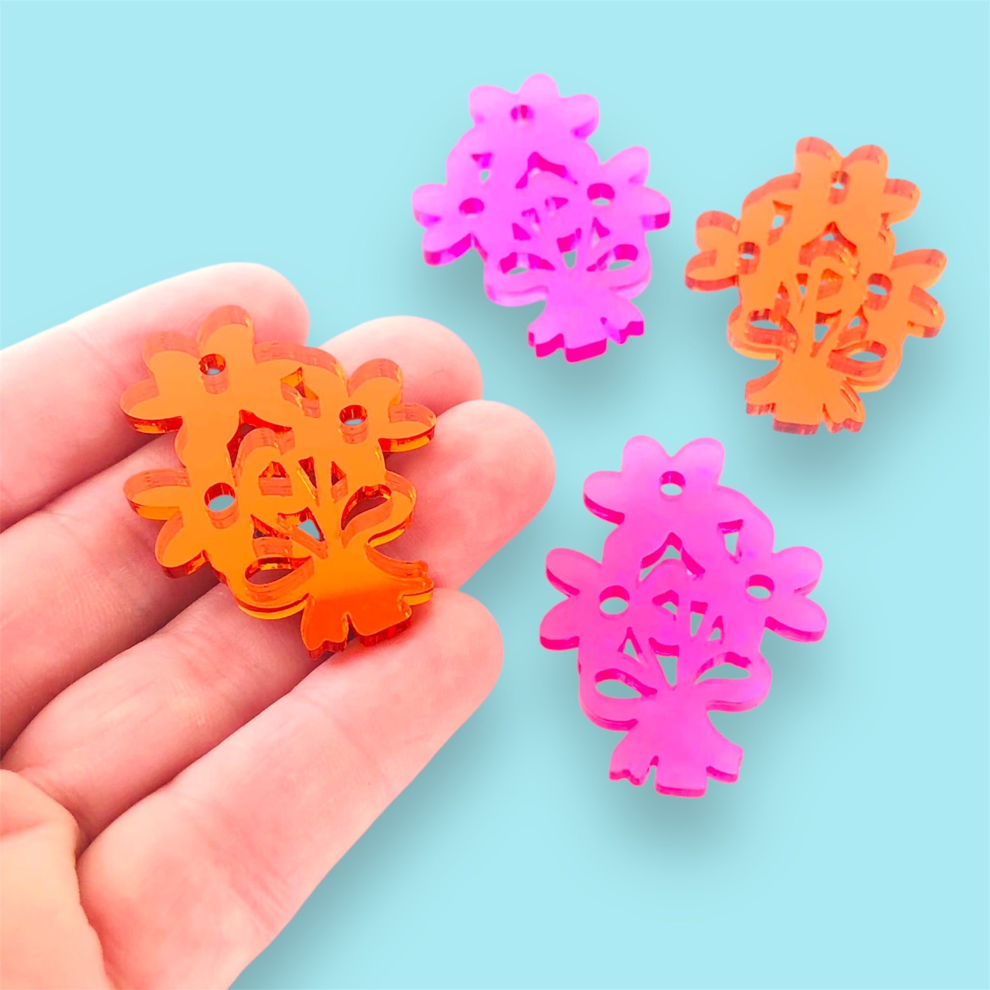 Pink  and orange laser-cut acrylic earring flower bouquet  shape by Crafty Cuts Laser