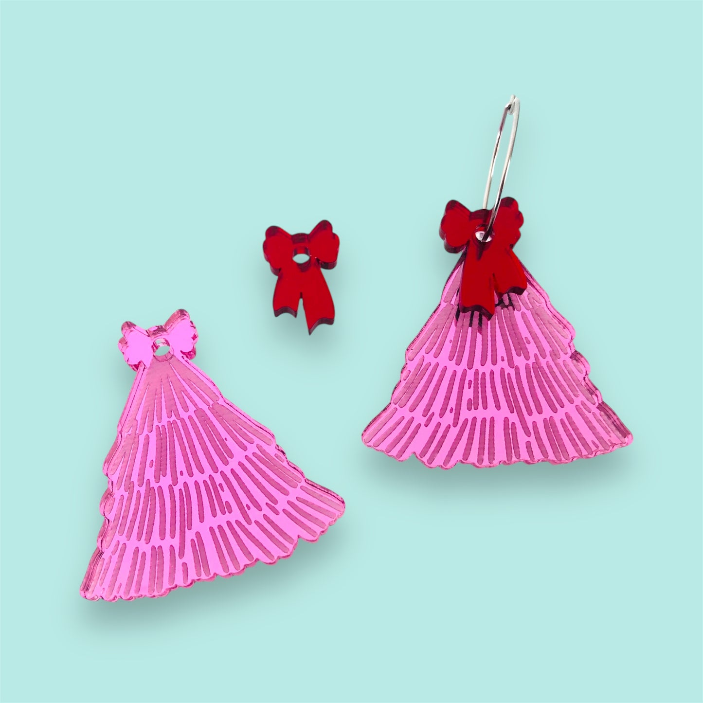 Pink mirror laser-cut acrylic earrings Christmas tree  shape by Crafty Cuts Laser