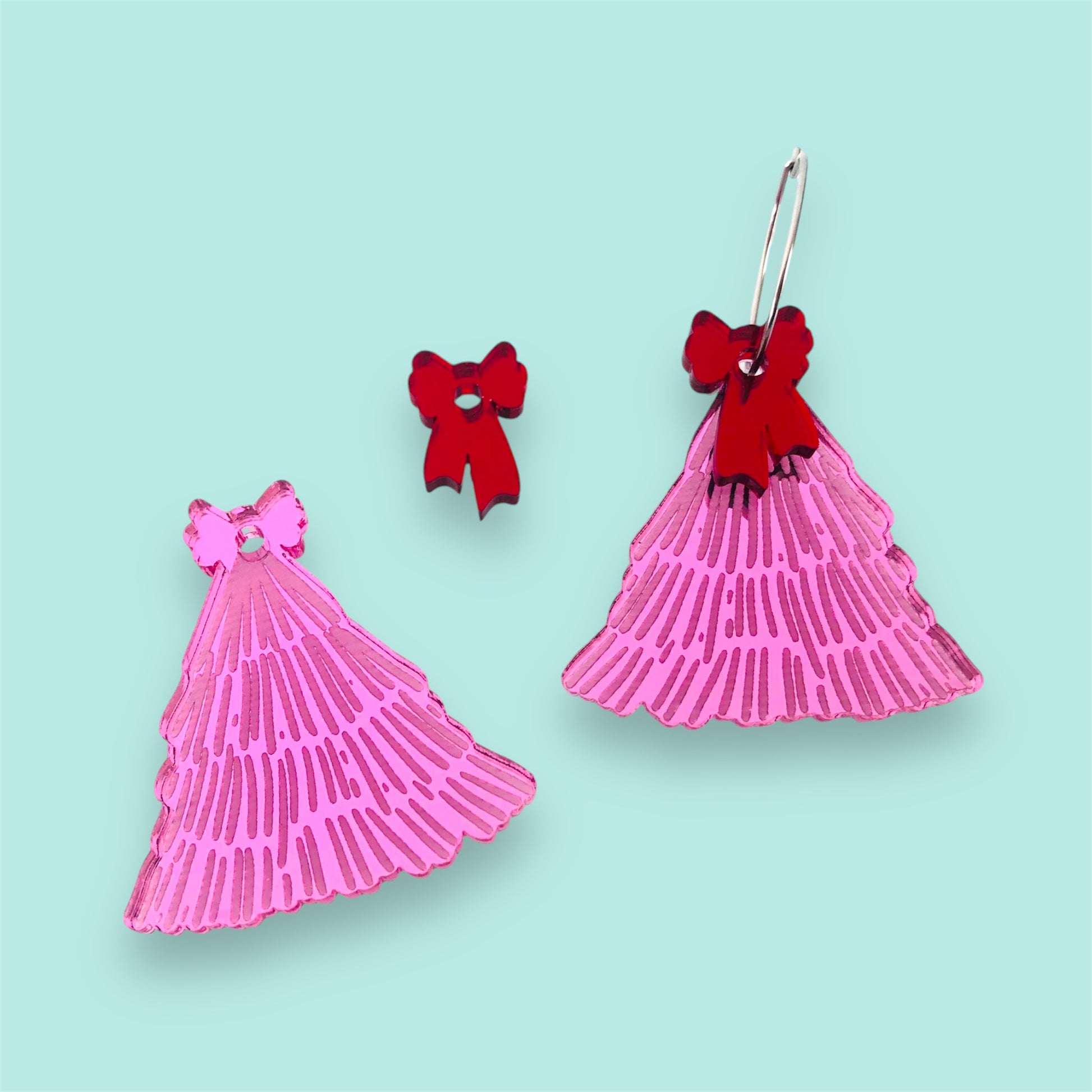 Pink mirror laser-cut acrylic earrings Christmas tree  shape by Crafty Cuts Laser